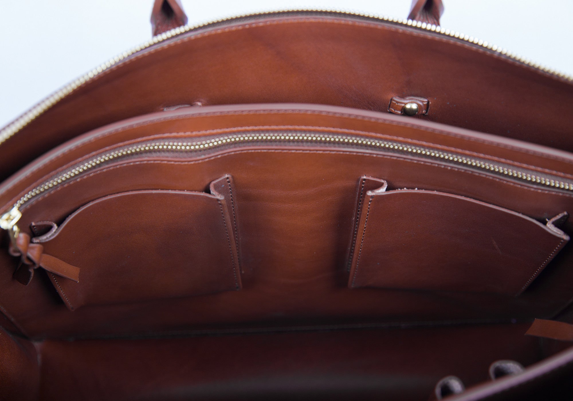 Inner Leather Pocket of The Bridle Triumph II Briefcase Cognac Bridle