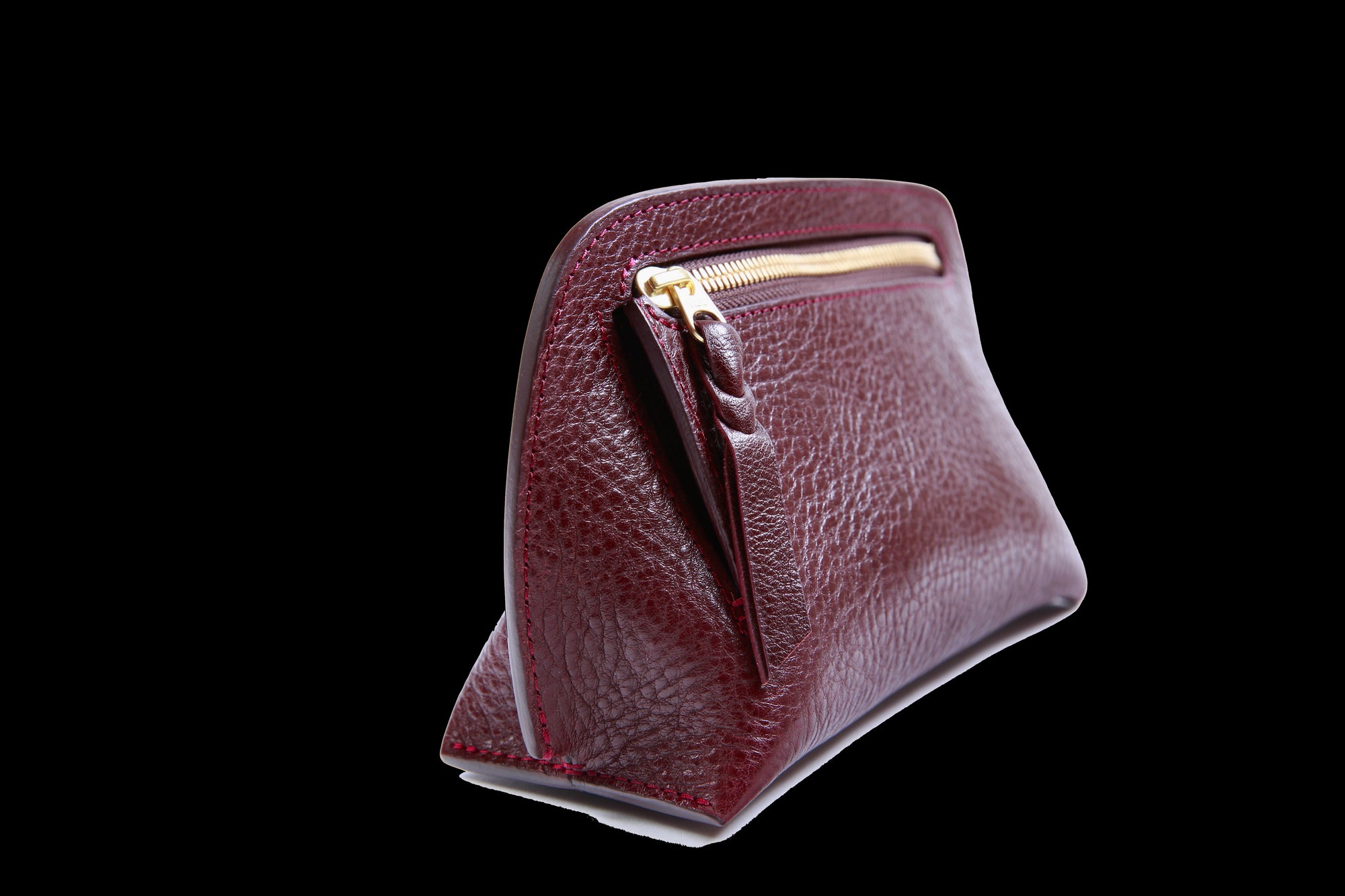 Side View of Mini Lois Pouch Cordovan