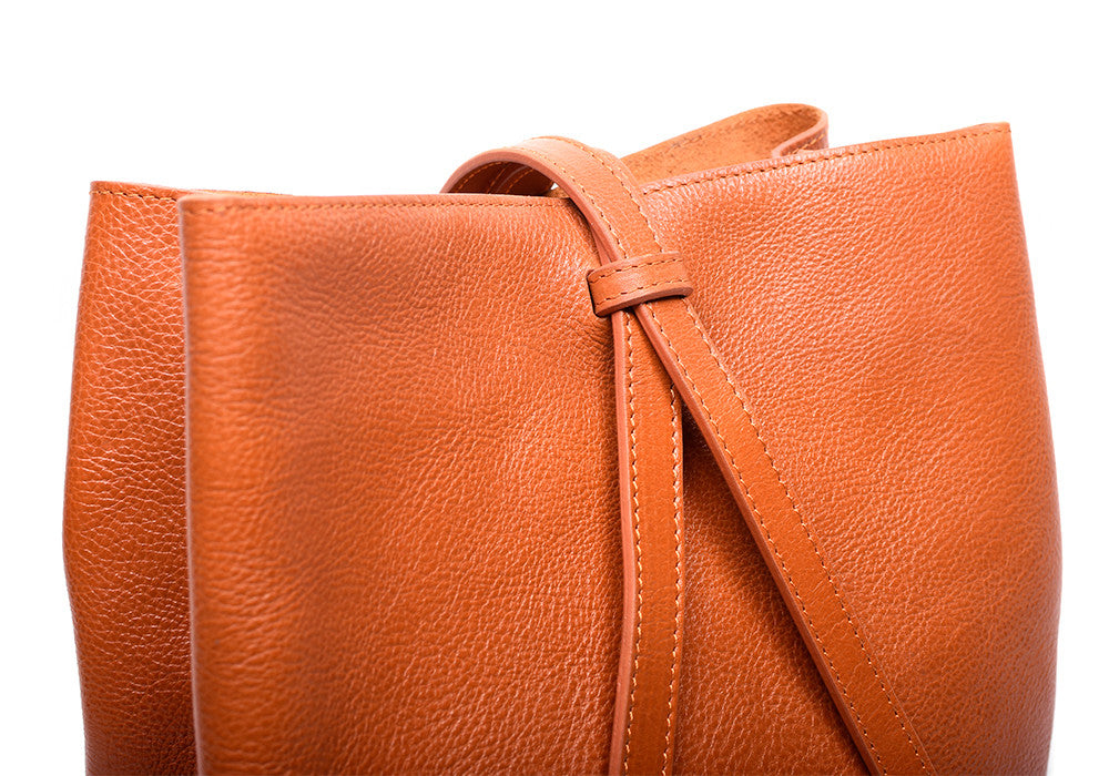 Leather Strap of The Sling Backpack Orange