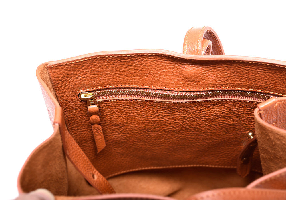 Inner Leather Pocket of The Sling Backpack Orange