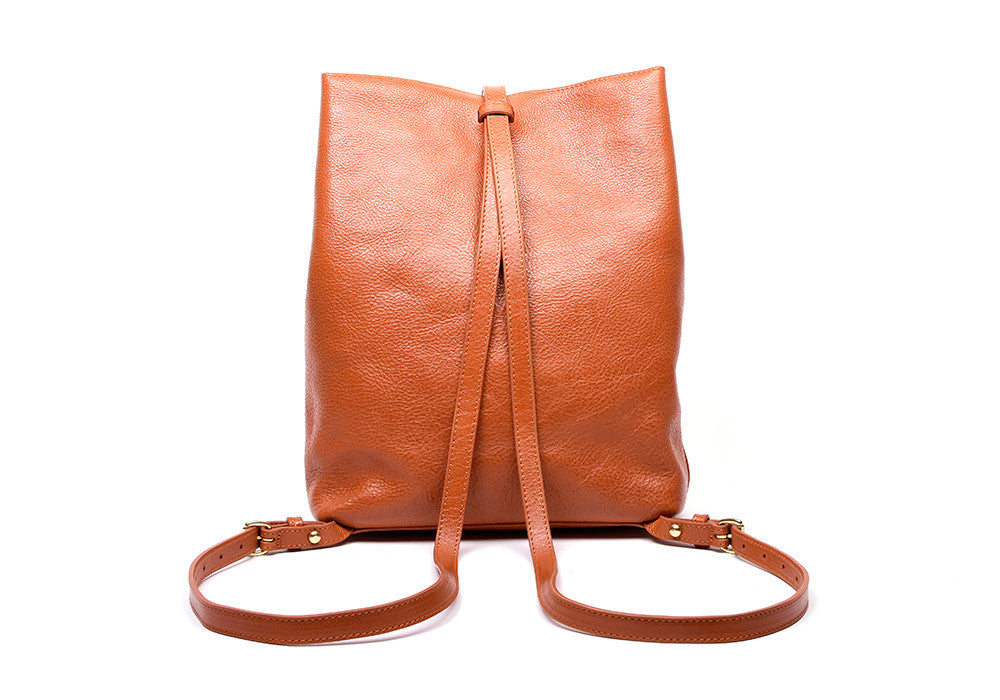 Back Leather Straps of The Sling Backpack Orange
