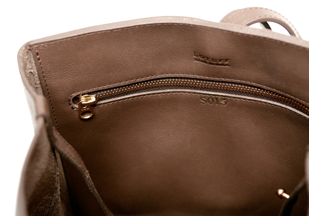 Inner Leather Pocket of The Sling Backpack Clay