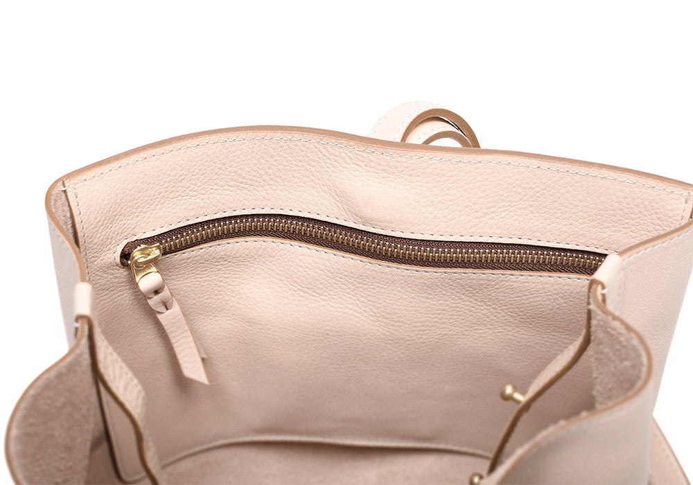 Inner Leather Pocket of The Sling Backpack Natural