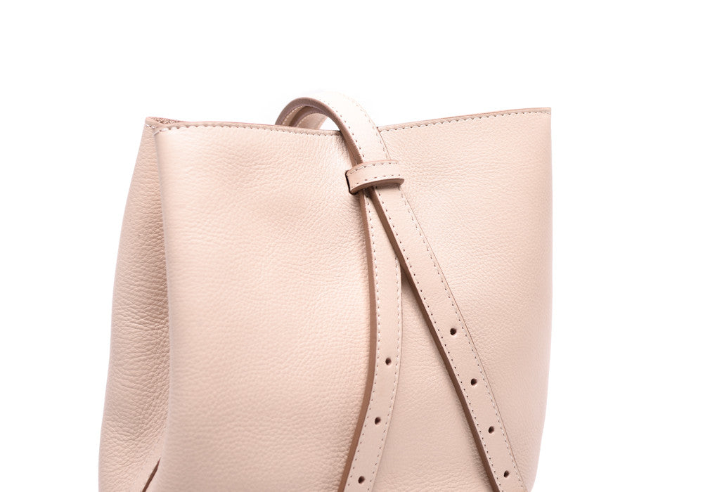 Back Leather Straps of The Mini Sling Backpack Natural