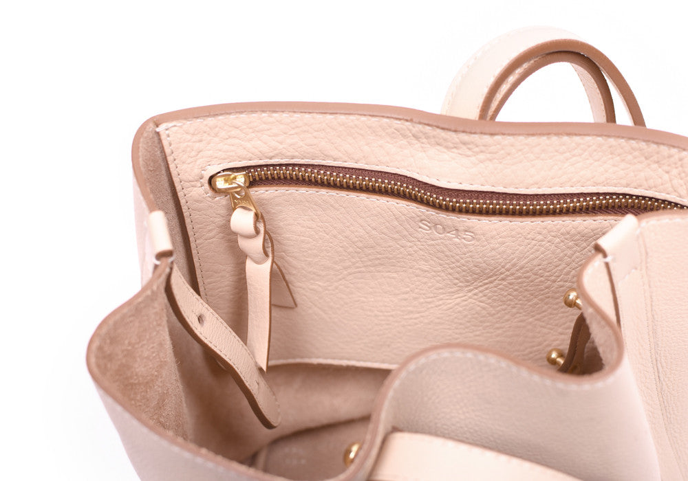 Inner Leather Pocket of The Mini Sling Backpack Natural